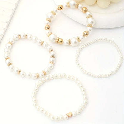 LUMIÈRE PEARL™ — ELEGANT WHITE 4PCS PEARL BEADED HANDMADE BRACELET SET